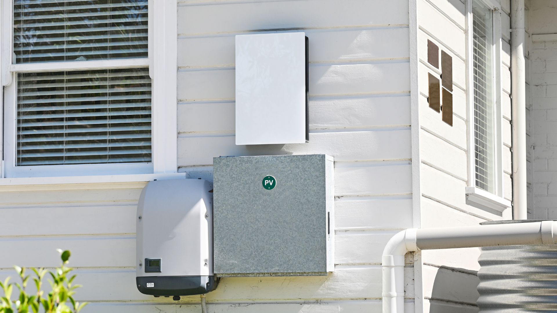 Battery and invertor unit on the side of a house